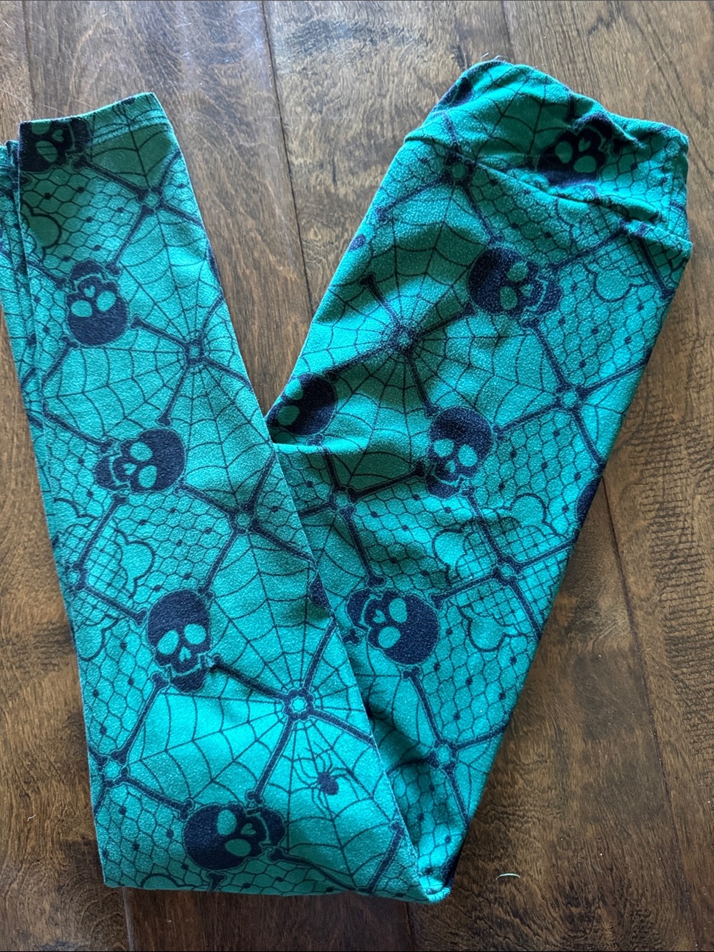 LuLaRoe Teal Leggings with Black Skull & Web Print